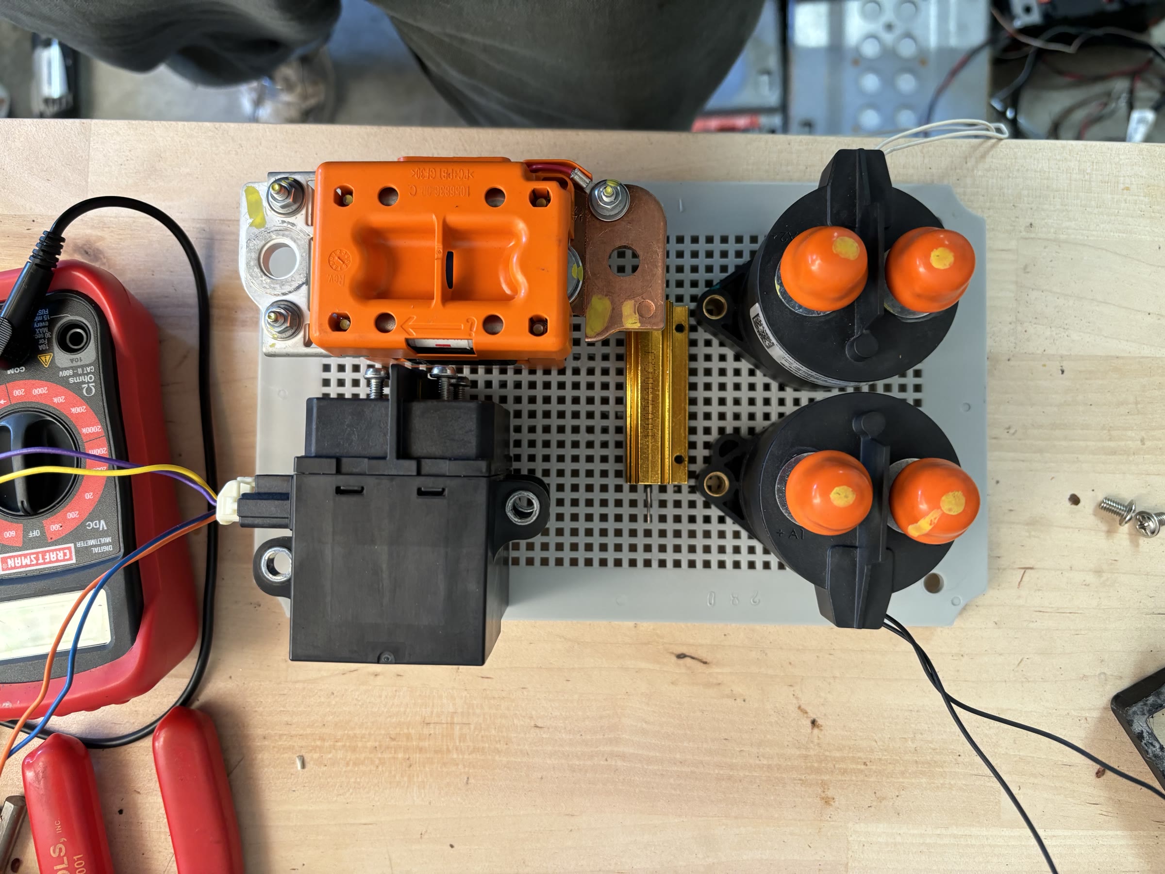 High-voltage junction box with contactors and precharge components